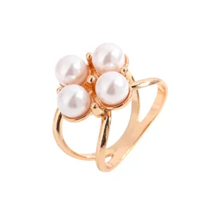 Elegant pearl silk scarf ring featuring a classic four-pearl cluster design in gold tone.