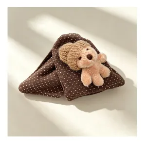 Molletta per capelli in tessuto a pois marrone con un simpatico orsacchiotto di peluche 3D.