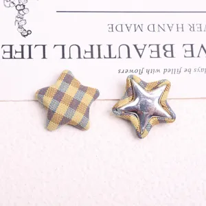Retro plaid star fabric buttons detail view, DIY coat clothing accessories and sewing parts.