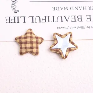 Close-up detail of retro plaid fabric star buttons, perfect for DIY coat accessories.