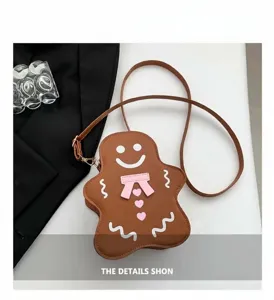 Niedliche lebkuchenmann geformte umhängetasche für damen stilvolle cartoon handtasche.
