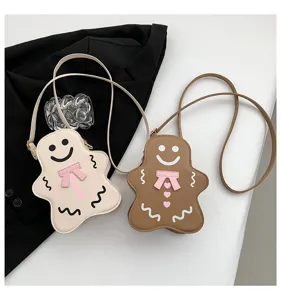 Niedliche Lebkuchenmann Umhängetasche mit rosa Schleife, süße Schultertasche für Damen