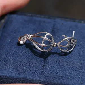 Vue détaillée du pendentif lanterne creux en argent S925 brut DIY pour perles de 6-8mm.