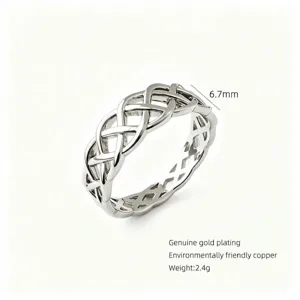 Detailed view of the intricate Celtic weave ring, showcasing fine cut-out metal texture.