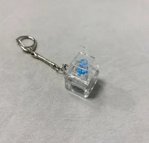 Transparent mechanical keyboard switch fidget toy keychain, portable stress relief toy.