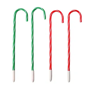 Christmas candy cane ballpoint pens, cute plastic festive gift pens in red and green colors.