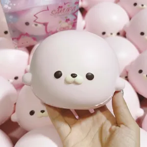 Juguete squishy de foca rosa rebote lento lindo descompresión PU animal antiestrés.