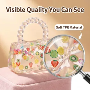 Bolso de juguete antiestrés transparente de TPR con frutas coloridas y dijes lindos rebote lento