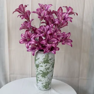 Artificial lily flower bouquet with splatter vase detail for home decor and interior styling.