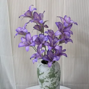 Artificial lily flowers bouquet with ceramic vase for home living room decor and wedding party.