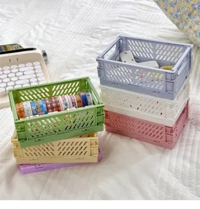 Vue détaillée des paniers de rangement pliables pastel pour organiser bureau et accessoires