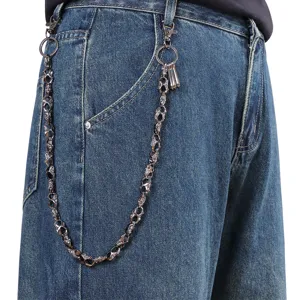 Close-up detail of metal skull pants chain, punk gothic waist chain for men and women.
