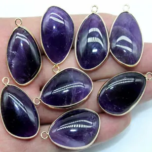 Natural amethyst teardrop pendant with gold plated bezel, detail view for DIY jewelry making.