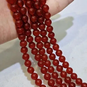 Perles rondes en agate rouge naturelle brutes pour fabrication de bijoux et bracelets.