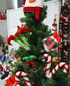 Decoraciones de arbol de navidad piernas de duende baston de caramelo punta de arbol.