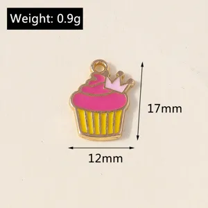 Close-up detail of a cute crown cupcake alloy enamel pendant, DIY jewelry making accessory.