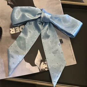 Blue satin rhinestone hair bow ribbon, elegant long scarf for women styling chic fashion.
