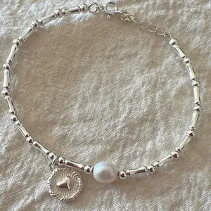 Chic bracciale in argento con bambù cuore e perla, elegante gioiello di stile coreano.