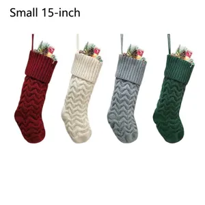 Detail view of small 15 inch knitted Christmas stockings in classic festive colors.
