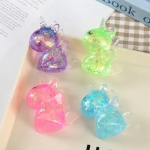 Giocattolo antistress unicorno glitterato squishy morbido set di quattro pezzi carini