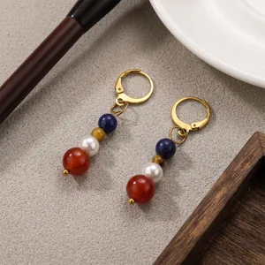 Orecchini pendenti con perle in pietra naturale retro e cerchi in acciaio inossidabile.