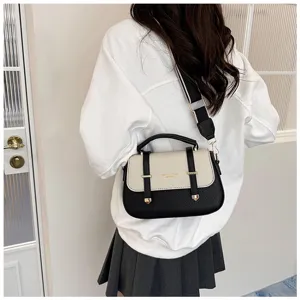 Chic contrast color saddle bag with double strap detail, retro style crossbody handbag for women.