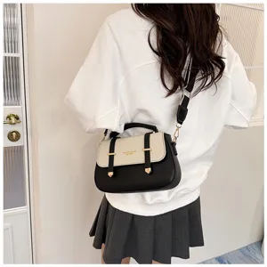 Women's two-tone crossbody shoulder bag with top handle, chic retro saddle bag design.