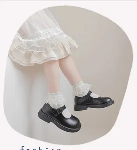 Zwarte Mary Jane kinderschoenen met witte kanten volants sokken schattige peuter detail