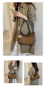 Retro suède schoudertas voor dames, stijlvolle bruine vintage crossbodytas voor dagelijks.