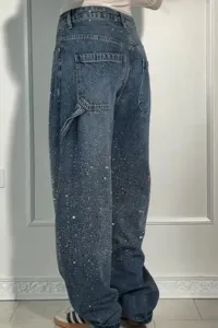 Detailed view of women's starry rhinestone denim casual long pants, trendy style.