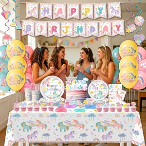Set di forniture per festa di compleanno unicorno arcobaleno con palloncini e piatti.