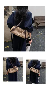 Detail view of the trendy Korean style polka dot shoulder bag, casual underarm design.