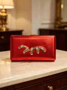 Red metallic box clutch evening bag with gold liquid metal rhinestone ornament for parties.