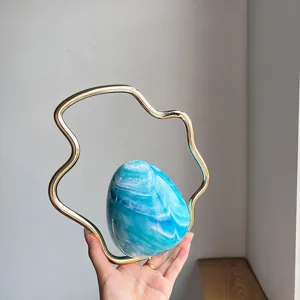 Unique cloud metal handle gradient egg evening bag detail view, chic niche design handbag.
