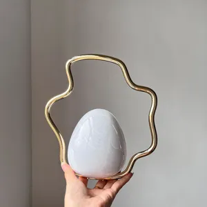 Chic French irregular evening bag, gradient eggshell body with cloud metal handle, niche design.