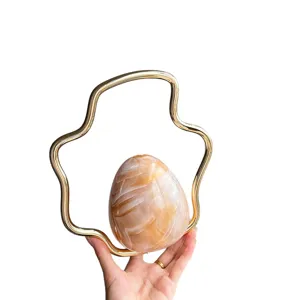 French chic irregular evening bag with metal handle and gradient eggshell design for women.