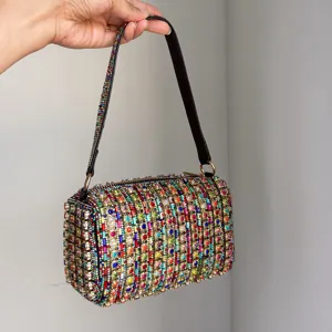 Sparkling rhinestone cylindrical shoulder bag, luxury bling underarm handbag for women party.