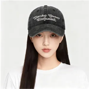 Vintage washed black baseball cap featuring Garden Centre Enthusiast white embroidery for casual.