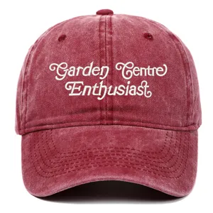 Close-up view of the vintage washed baseball cap with white embroidered text detail.