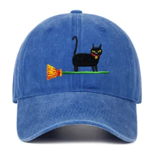 Vintage washed blue baseball cap with cute black cat and broom embroidery design.
