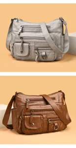 Multi-pocket soft leather shoulder bag detail, showing multiple zippers and vintage crossbody style.