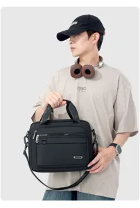 Detailaufnahme der schwarzen Business-Herrentasche mit Fronttaschen und praktischem Tragegriff.