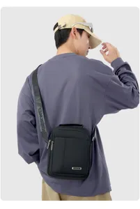 Herren Freizeit Umhaengetasche schwarz mehrlagige vertikale Schultertasche mit Gurt