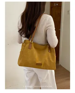 Retro grote capaciteit vrouwen tote tas herfst nieuwe schoudertas elegante stijl detail
