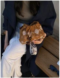 Vintage brown suede handbag with ethnic embroidery and chic beaded strap for women daily autumn style