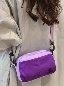 Bolso cruzado ligero para mujer, elegante bolso para teléfono multiusos de tela morada.