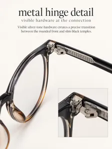 Detailed view of stylish oval sunglasses featuring visible metal hinge hardware and slim temples.