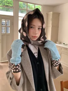 Retro polka dot knitted triangular scarf and warm gloves set, cozy winter accessory for women.