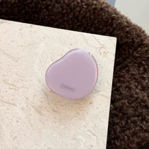 Vista dettagliata dell'elegante impugnatura per telefono geometrica viola, supporto in resina.