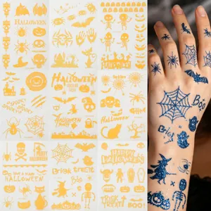 Autocollants de tatouage temporaire pailletés d'Halloween pour déguisement de fête.